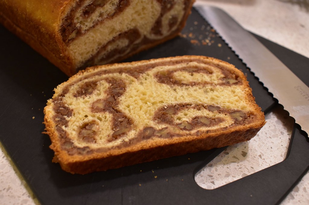 marbled pecan bread in a slice
