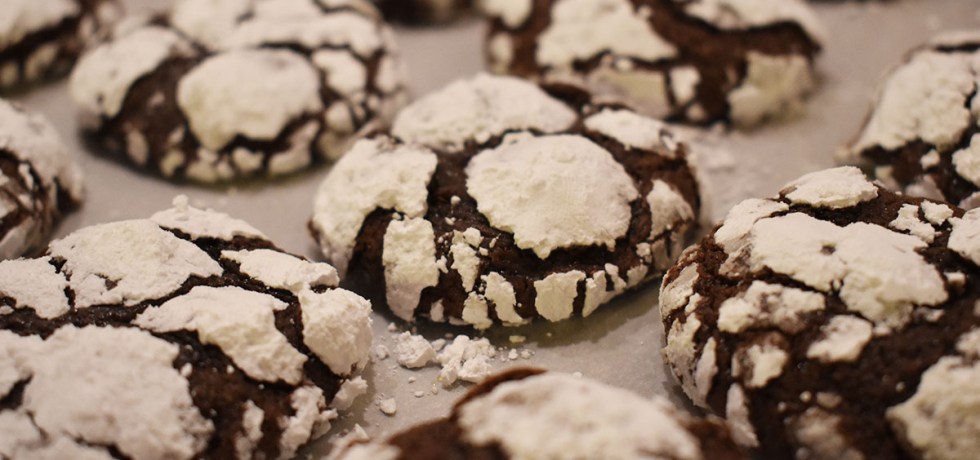Chewy Chocolate Brownie Crinkle Cookies covered in powdered sugar
